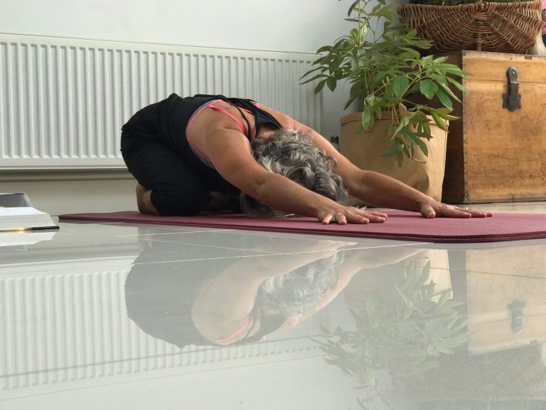 Balasana with Reflection 2 scaled 1 768x576